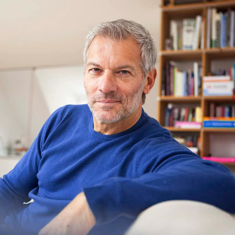 portrait-of-relaxed-man-at-home-EFLEKCX.jpg