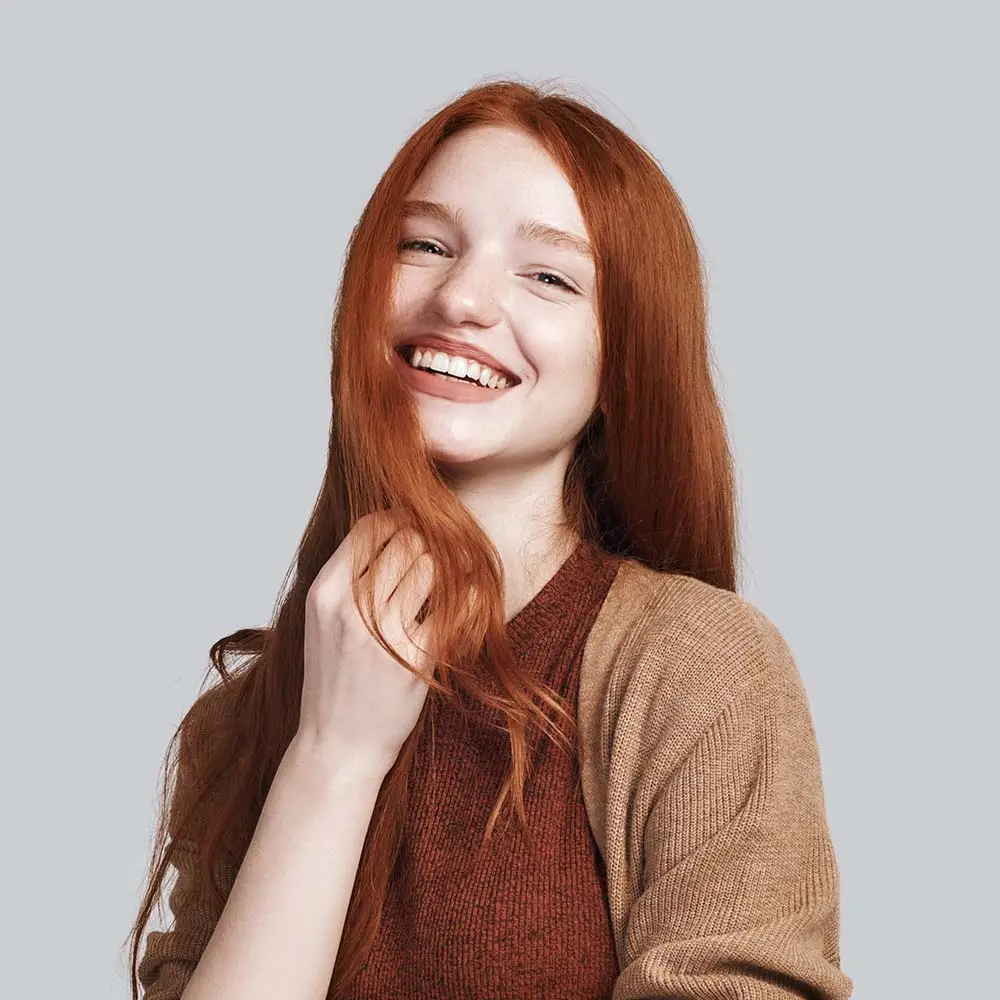 sunny-girl-portrait-of-positive-and-cute-young-re-WPEKU5B.jpg